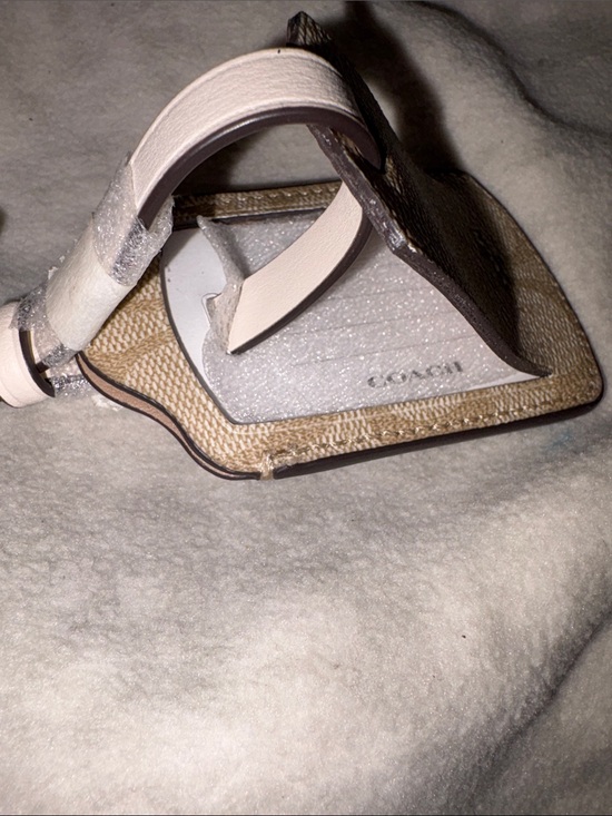 Coach Handbags - NWT Coach Signature Canvas Luggage Tag with Pale NUDE Strap